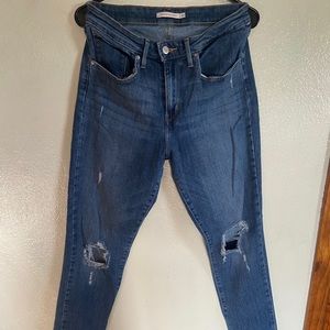 Distressed Levi’s blue jeans